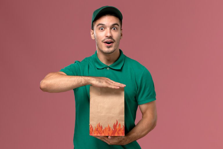 front-view-male-courier-green-uniform-holding-paper-food-package | HOVARLAY