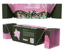 Long rectangular packaging box with pink and green floral design and a black cat silhouette on the front, shown in two angles (top and side).