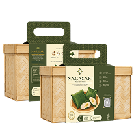 Two wooden gift crates with green labels showing a boxed gourmet product on the front.